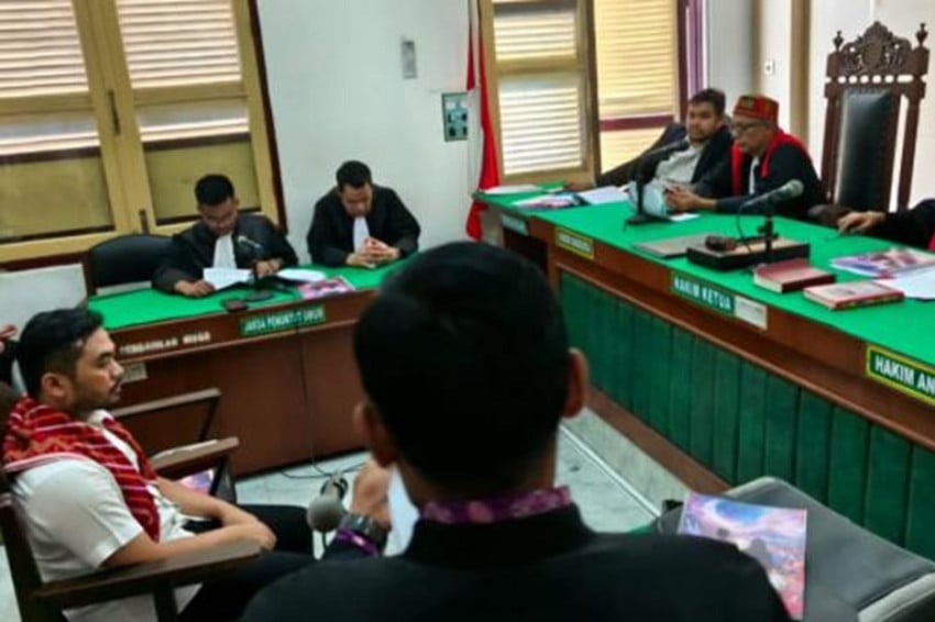 Videografer Amsal Christy Sitepu divonis bebas oleh Majelis Hakim PN Medan dalam sidang pembacaan putusan yang digelar hari ini, Rabu (1/4/2036). Foto/iNews